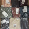 The photo shows a package with clothing in the category YA.
