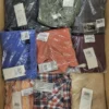 The photo shows a package with clothing in the category YA.