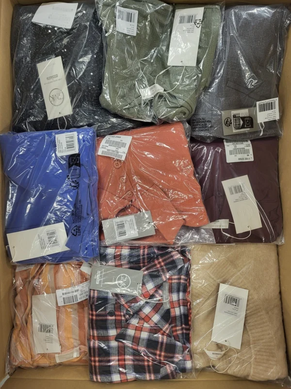 The photo shows a package with clothing in the category YA.