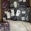 The photo shows a package with clothing in the category YA.