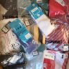 The photo shows a package with clothing in the category H.