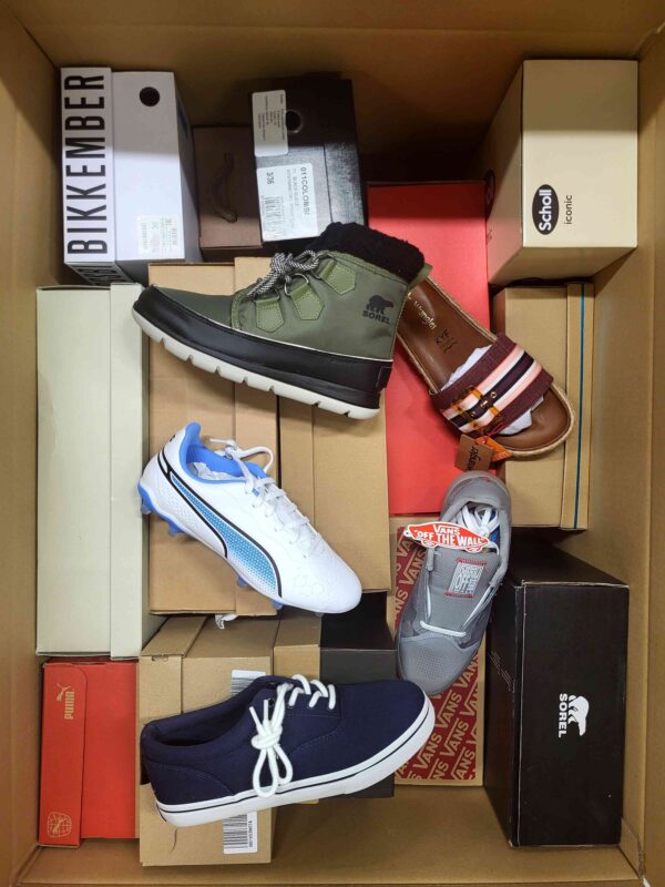 The photo shows a package with footwear in the category AS.