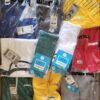 The photo shows a package with clothing in the category H.