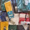 The photo shows a package with clothing in the category H.