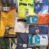 The photo shows a package with clothing in the category H.