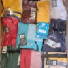 The photo shows a package with clothing in the category H.