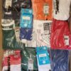 The photo shows a package with clothing in the category H.