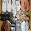The photo shows a package with footwear in the category CSU.