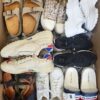 The photo shows a package with footwear in the category CSU.