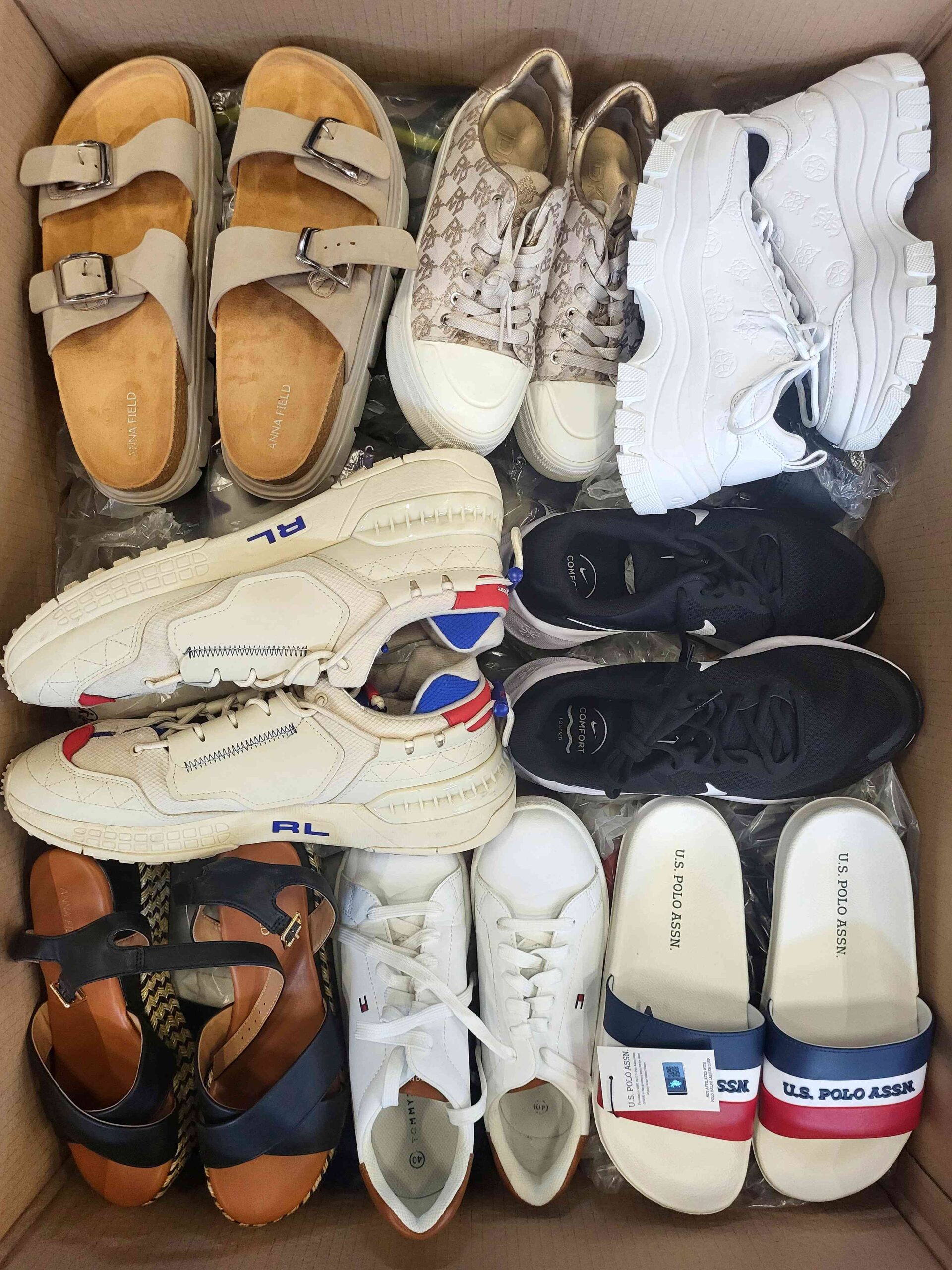 The photo shows a package with footwear in the category CSU.