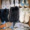 The photo shows a package with footwear in the category CSU.