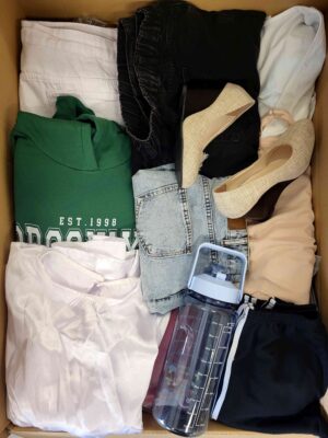 The photo shows a package with clothing in the category BSN.