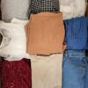 The photo shows a package with clothing in the category BSN.