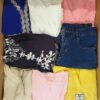 The photo shows a package with clothing in the category BSN.