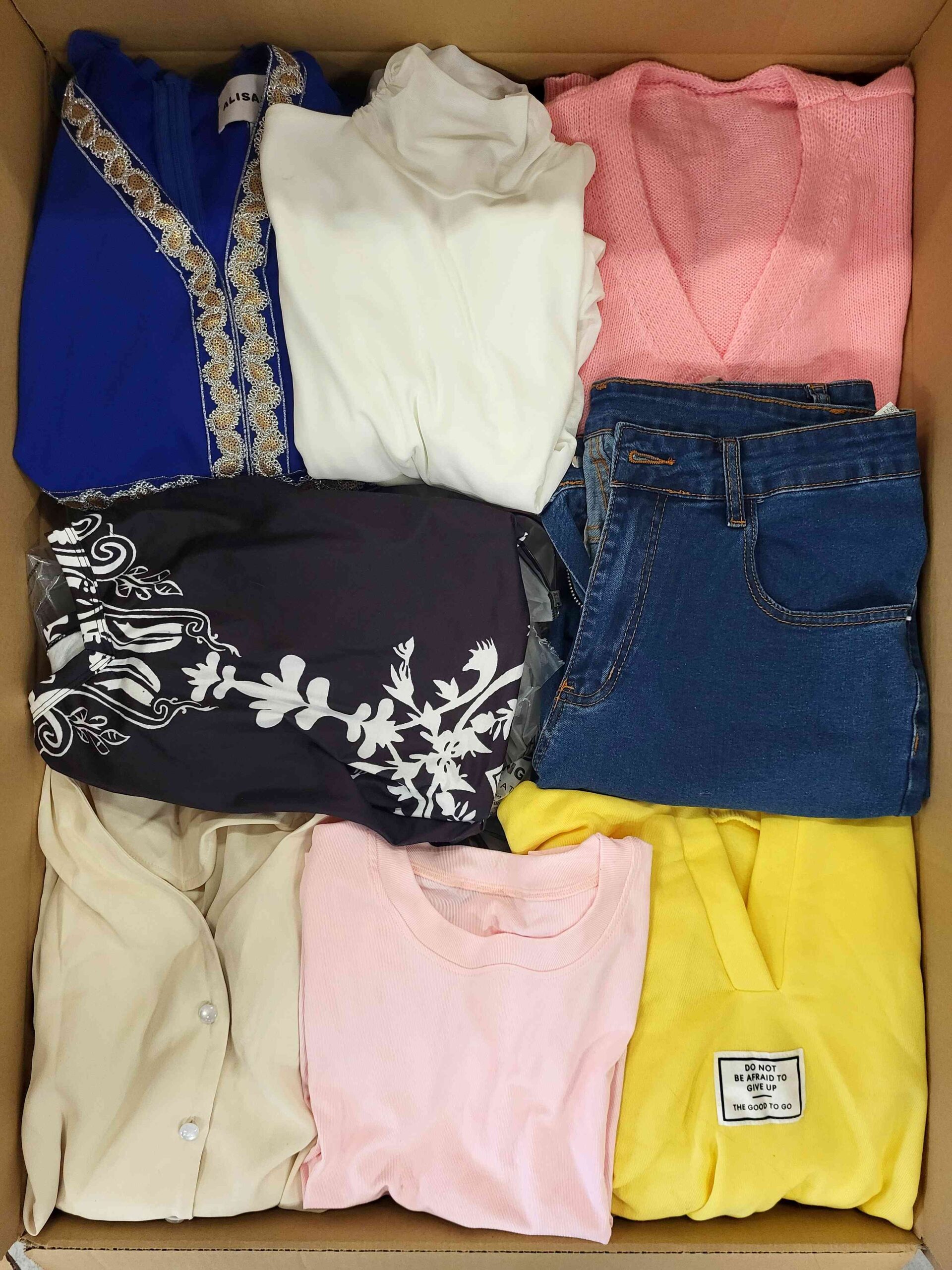 The photo shows a package with clothing in the category BSN.