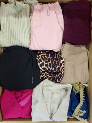 The photo shows a package with clothing in the category BSN.