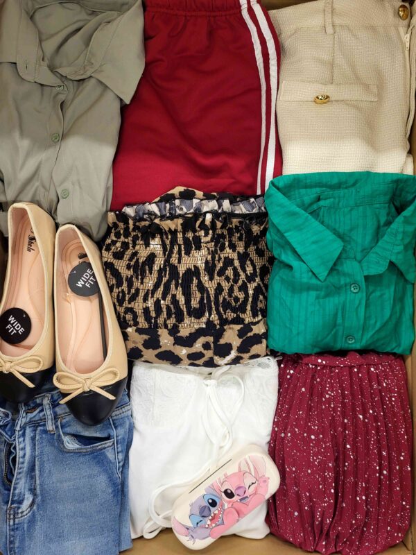The photo shows a package with clothing in the category BSN.