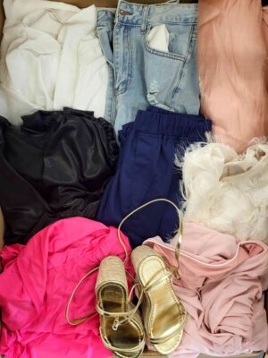 The photo shows a package with clothing in the category BSN.