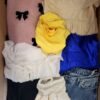 The photo shows a package with clothing in the category BSN.