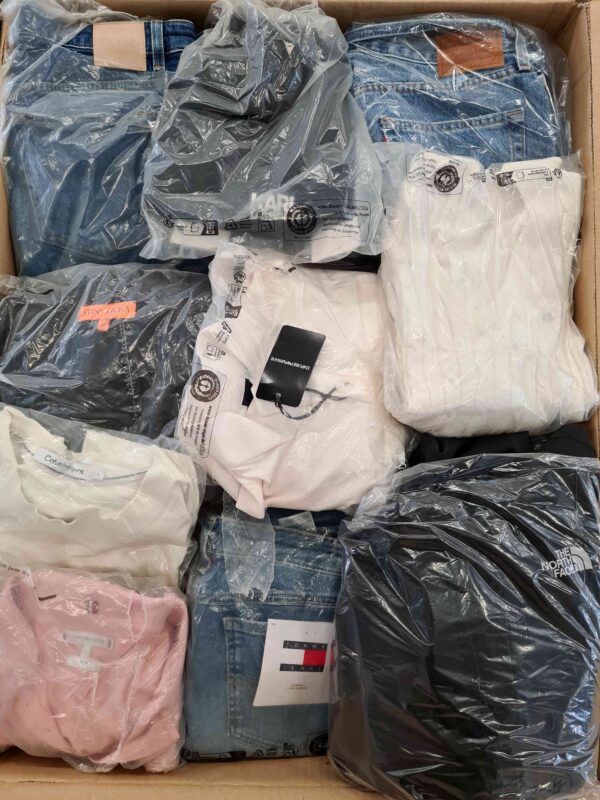 The photo shows a package with clothing in the category D.