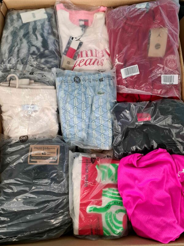 The photo shows a package with clothing in the category D.