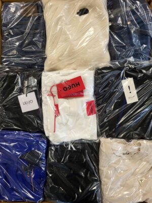 The photo shows a package with clothing in the category C.