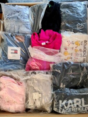 The photo shows a package with clothing in the category D.