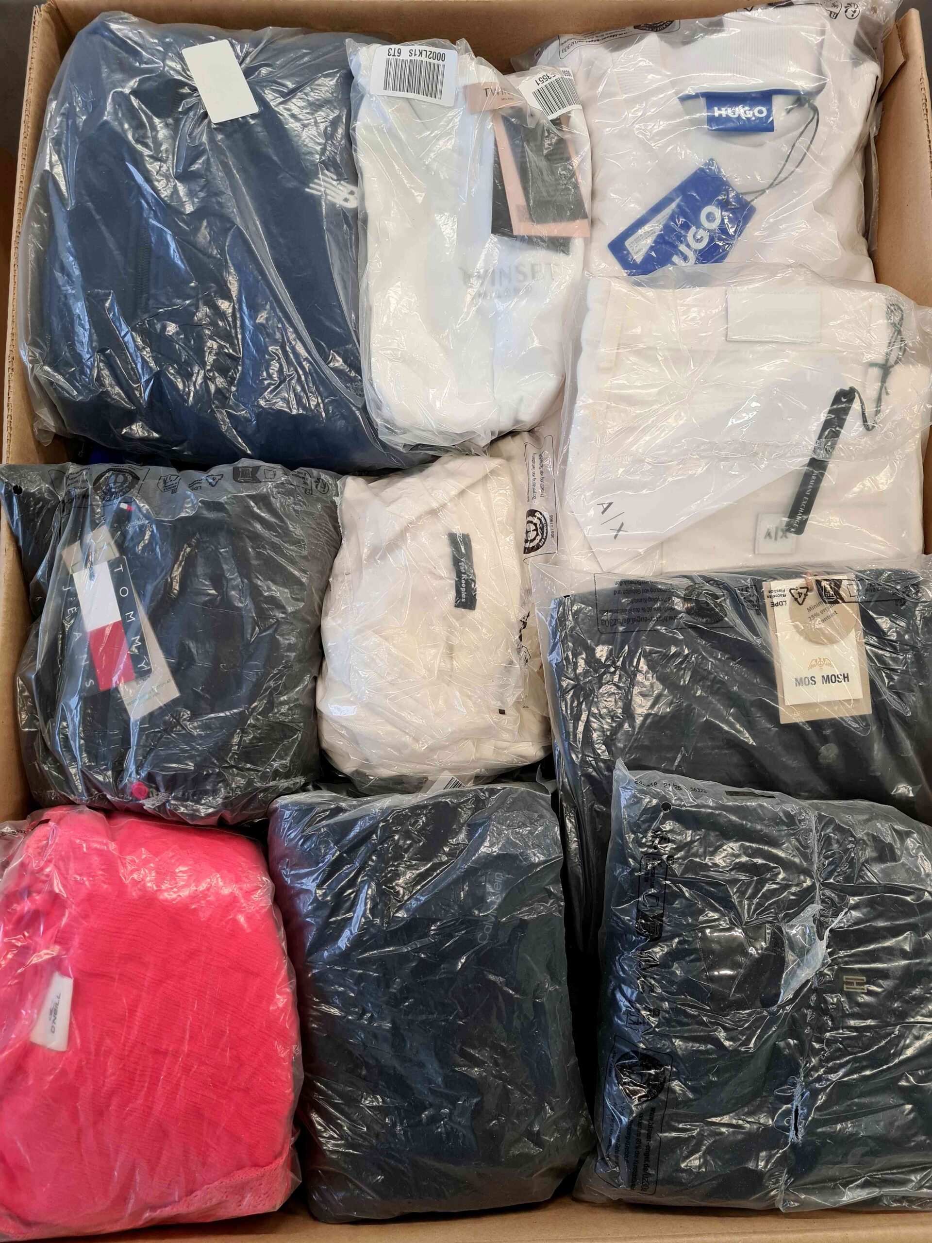 The photo shows a package with clothing in the category D.