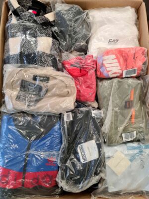 The photo shows a package with clothing in the category D.