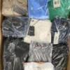 The photo shows a package with clothing in the category C.