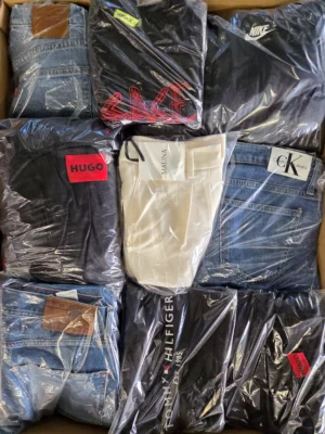 The photo shows a package with clothing in the category C.