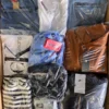 The photo shows a package with clothing in the category C.