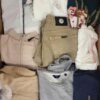 The photo shows a package with clothing in the category U.