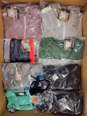 The photo shows a package with clothing in the category AP.