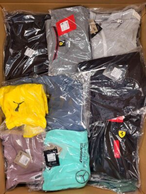 The photo shows a package with clothing in the category AP.