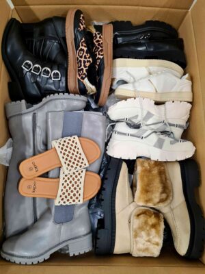 The photo shows a package with clothing in the category BPS.