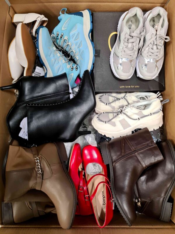 The photo shows a package with clothing in the category BPS.