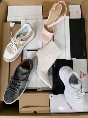 The photo shows a package with footwear in the category BS.