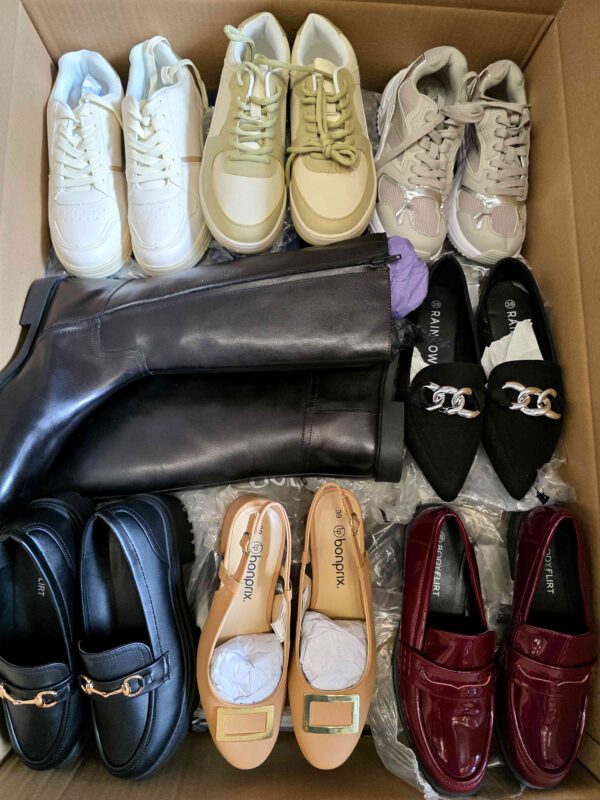 The photo shows a package with clothing in the category BPS.