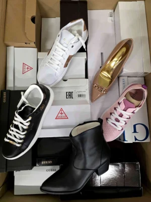 The photo shows a package with footwear in the category BS.