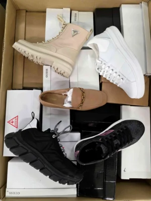 The photo shows a package with footwear in the category BS.