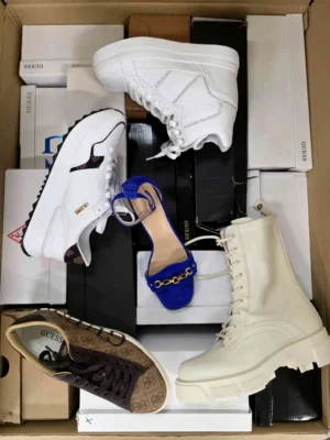 The photo shows a package with footwear in the category BS.