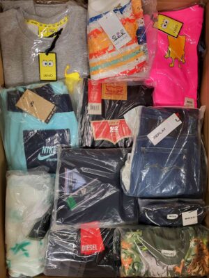 The photo shows a package with clothing in the category K.