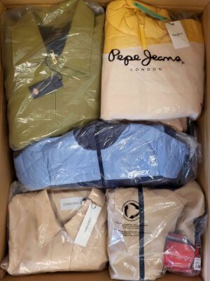 The photo shows a package with clothing in the category AJS.