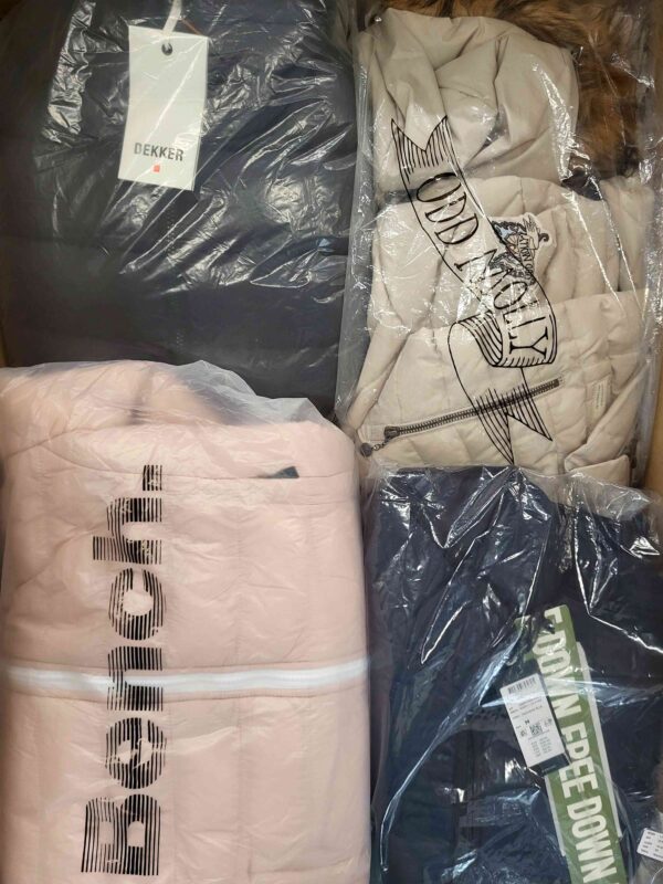 The photo shows a package with clothing in the category AJW.