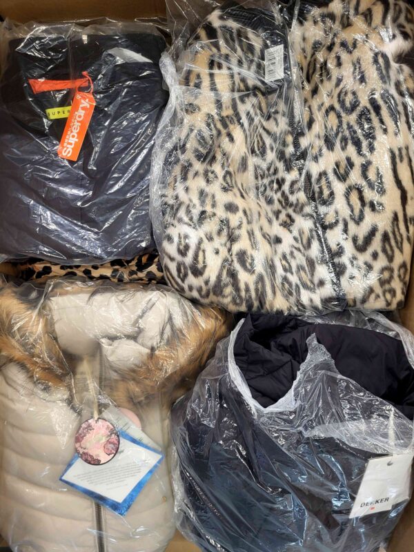 The photo shows a package with clothing in the category AJW.
