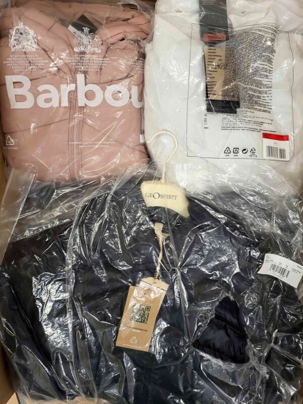 The photo shows a package with clothing in the category AJW.