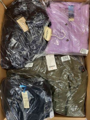 The photo shows a package with clothing in the category AJW.
