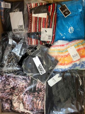 The photo shows a package with clothing in the category AP.