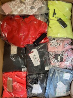 The photo shows a package with clothing in the category AP.
